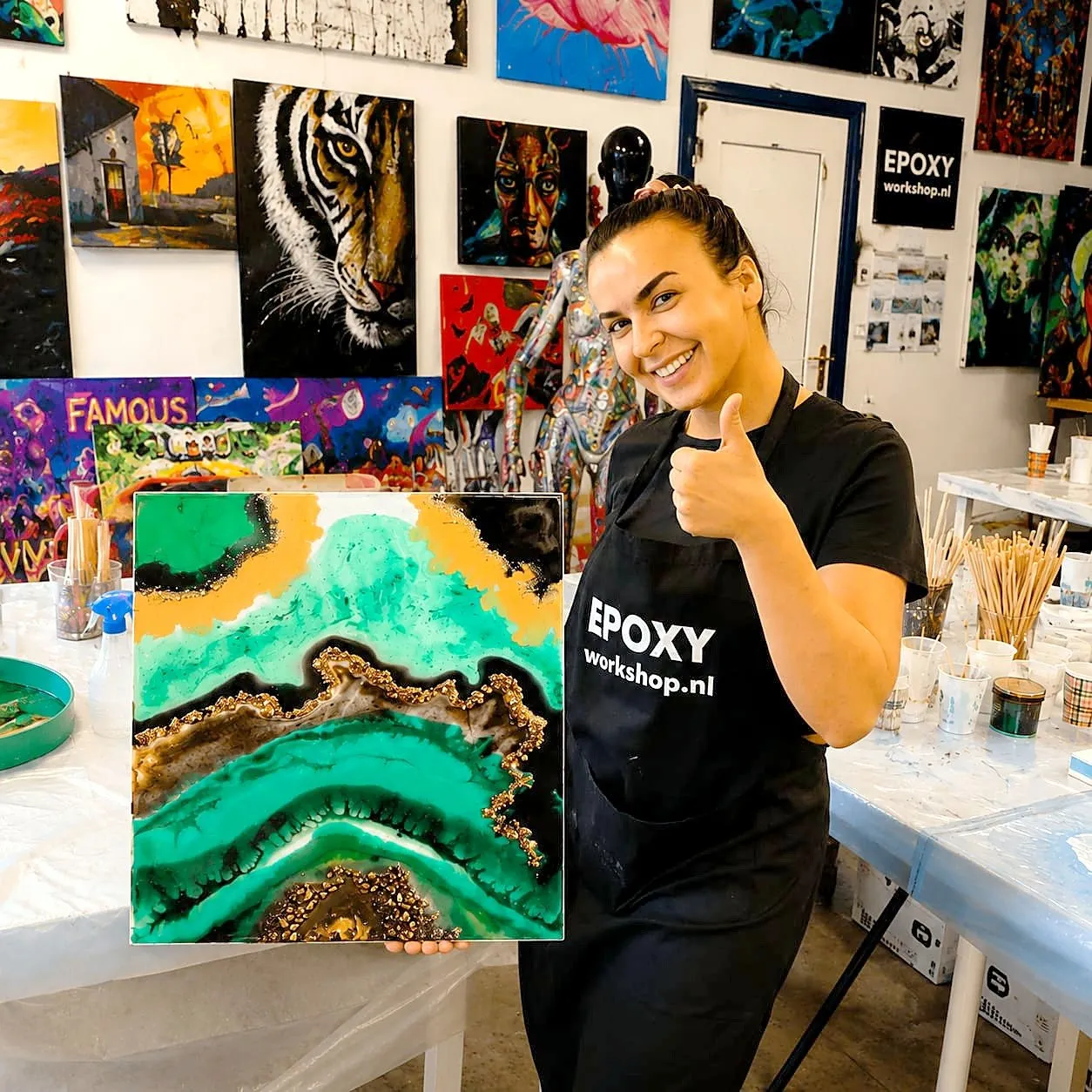 Participant with her own green and gold Geode Art panel